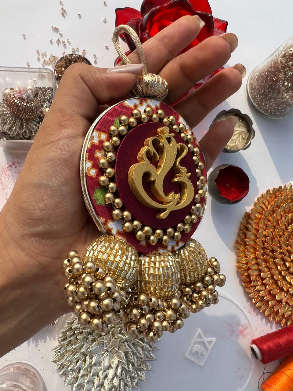 Bling Maroon Navratna Patola Ganesh Charms: Set of 2