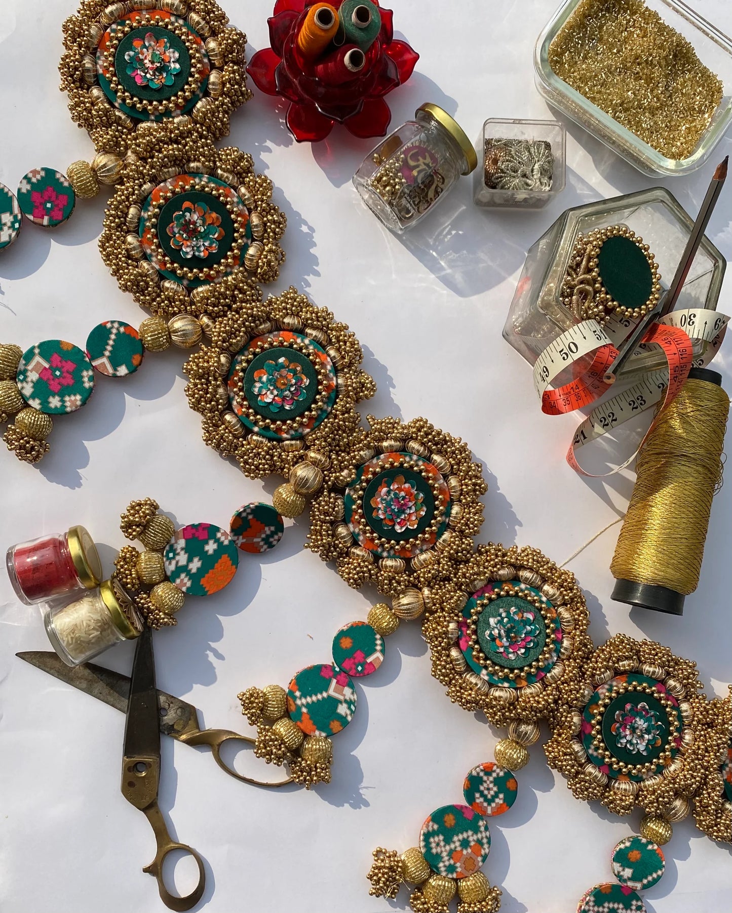 Chic-O-Fleek Dangler Colossal Toran 1: Bottle Green Navratna Patola & OG Infloresence Divine Pichwai Toran (Flexible)