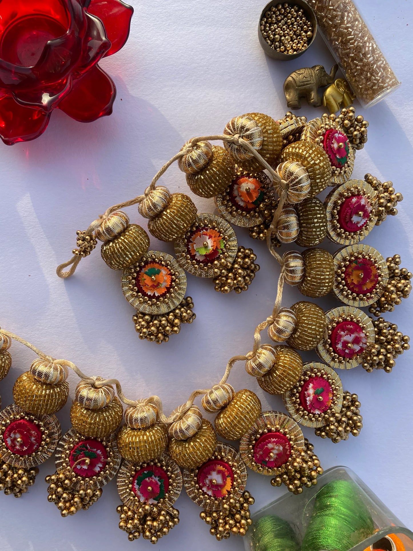The Ready To Glam Pink & Golden Yellow Navratna Patola Gota Prakash Emblem Two Way Lumba Toran